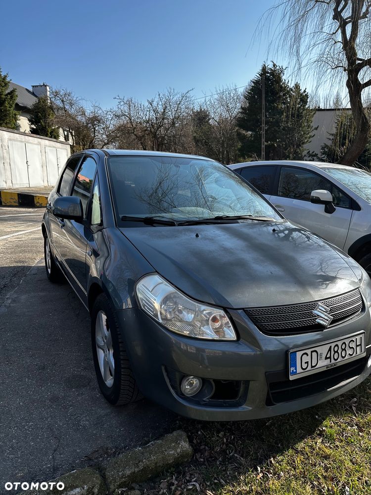 Suzuki SX4 1.6 GLX / Comfort - 1