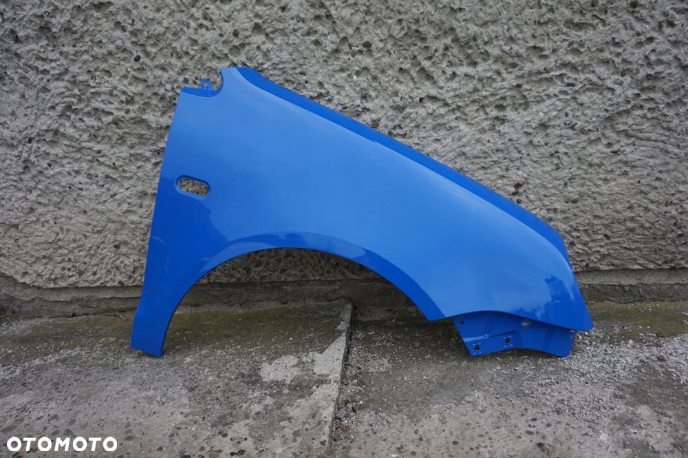 BŁOTNIK PRZÓD PRAWY VW POLO 9N OKULAR LA5F 01/05r - 1