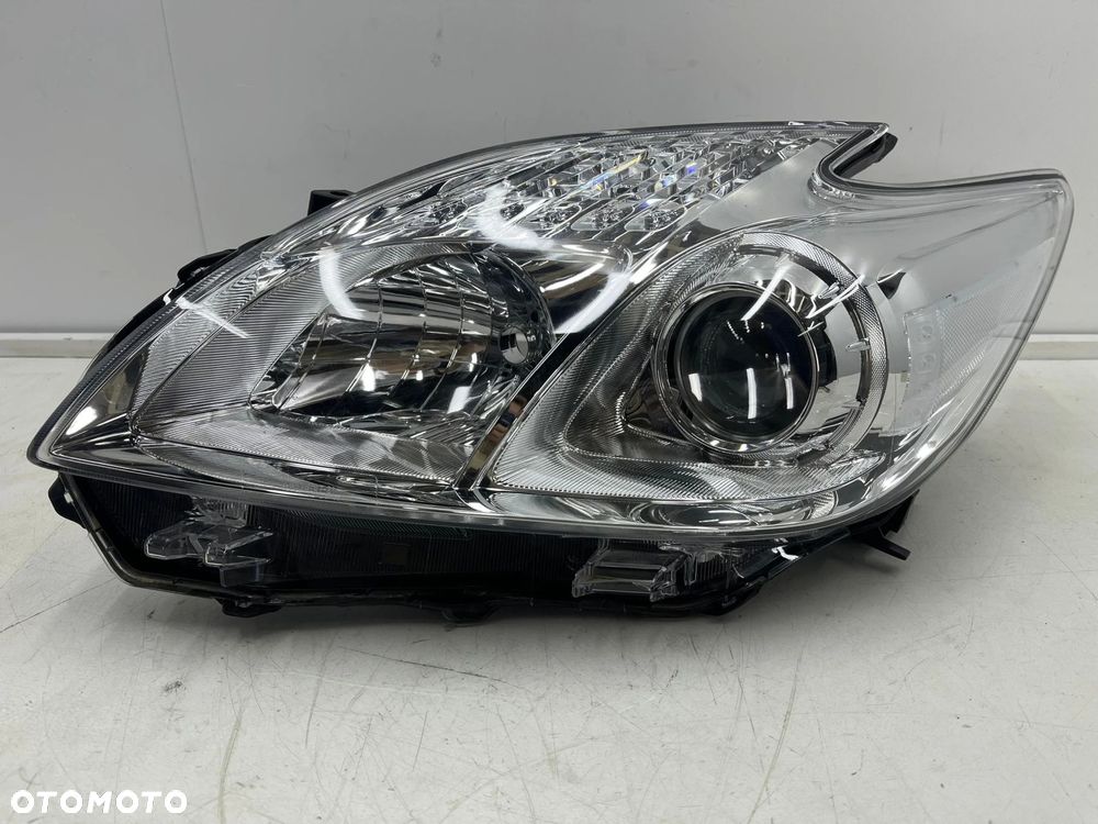 Lampa reflektor Toyota Prius 3 III Lift 12-16r. lewa przednia EU oryginał soczewka lewy przód 81170- - 1