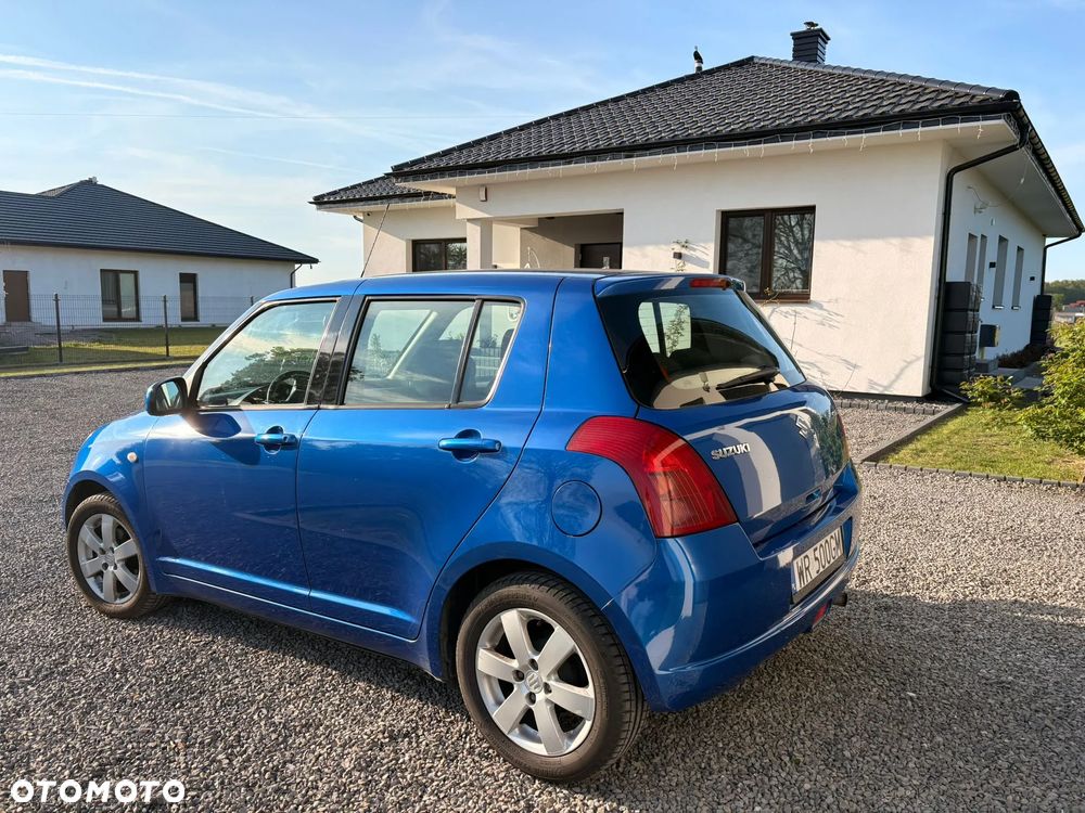 Suzuki Swift 1.3 Club - 4