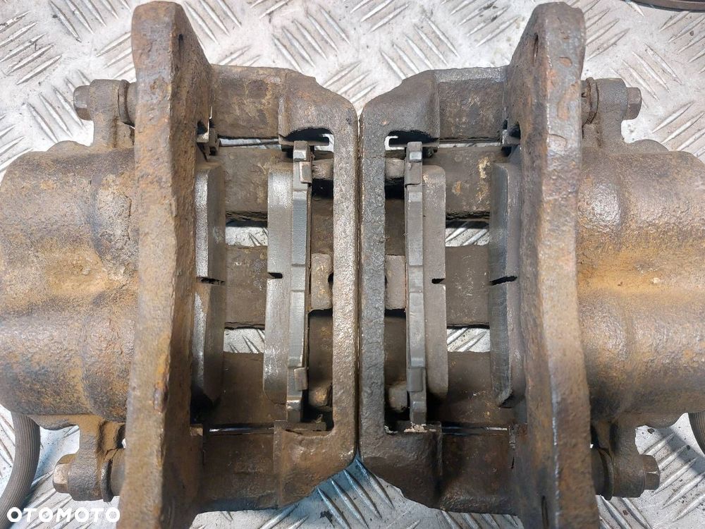 TARCZE HAMULCOWE PRZÓD + KLOCKI + ZACISKI SUBARU FORESTER I LIFT 2.0 - 2