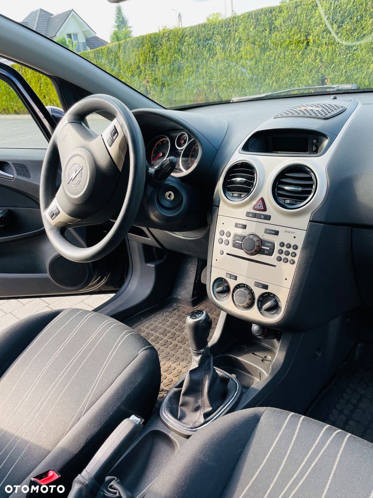Opel Corsa 1.2 16V Enjoy - 11