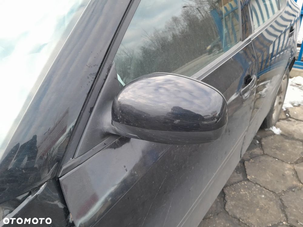 Lusterko zewnętrzne lewe elektryczne SKODA Fabia II 07-14r. 9910 - 1