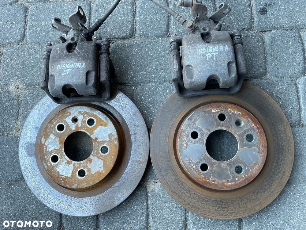 Opel Insignia A ZACISKI HAMULCOWE TARCZE KLOCKI KOMPLET PRZÓD 321 TYŁ 292 - 4