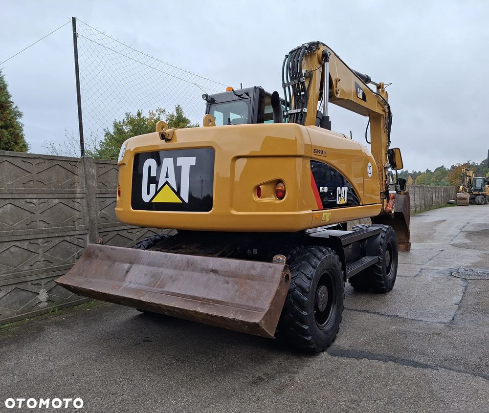 Caterpillar CAT M 313 D - 8
