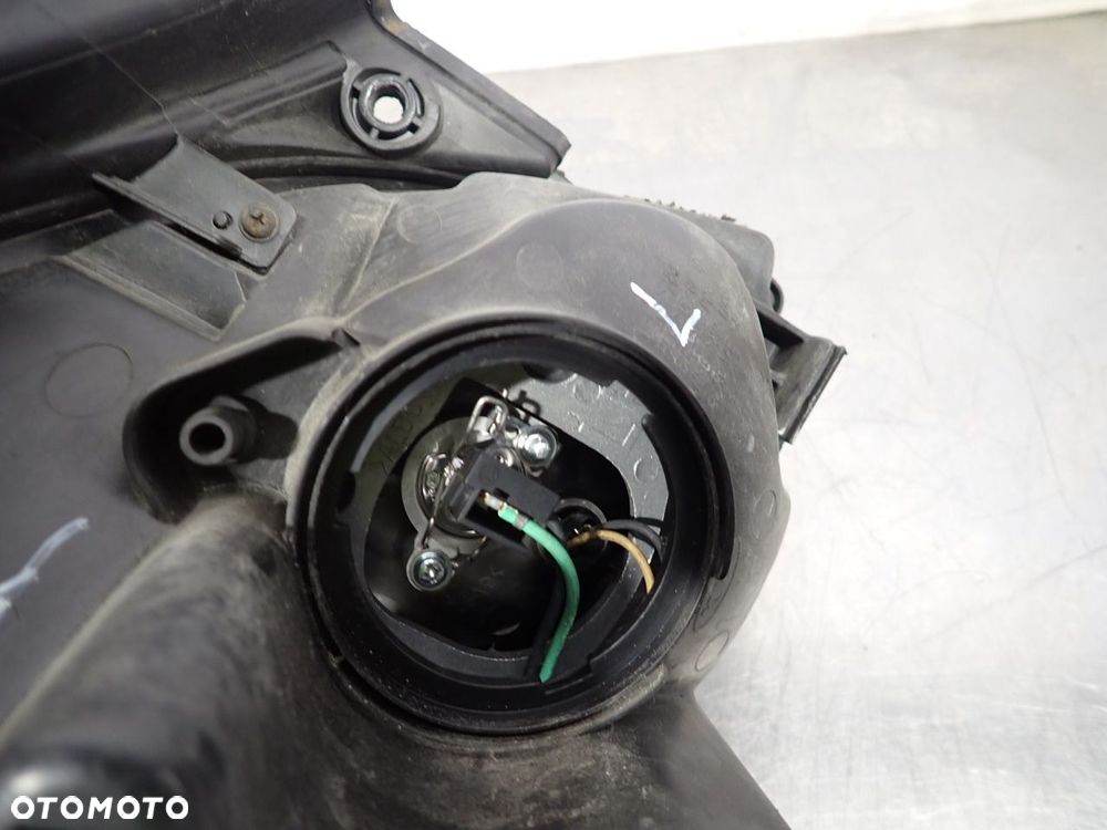 LAMPA LEWA PRZEDNIA KIA CARENS III - 10