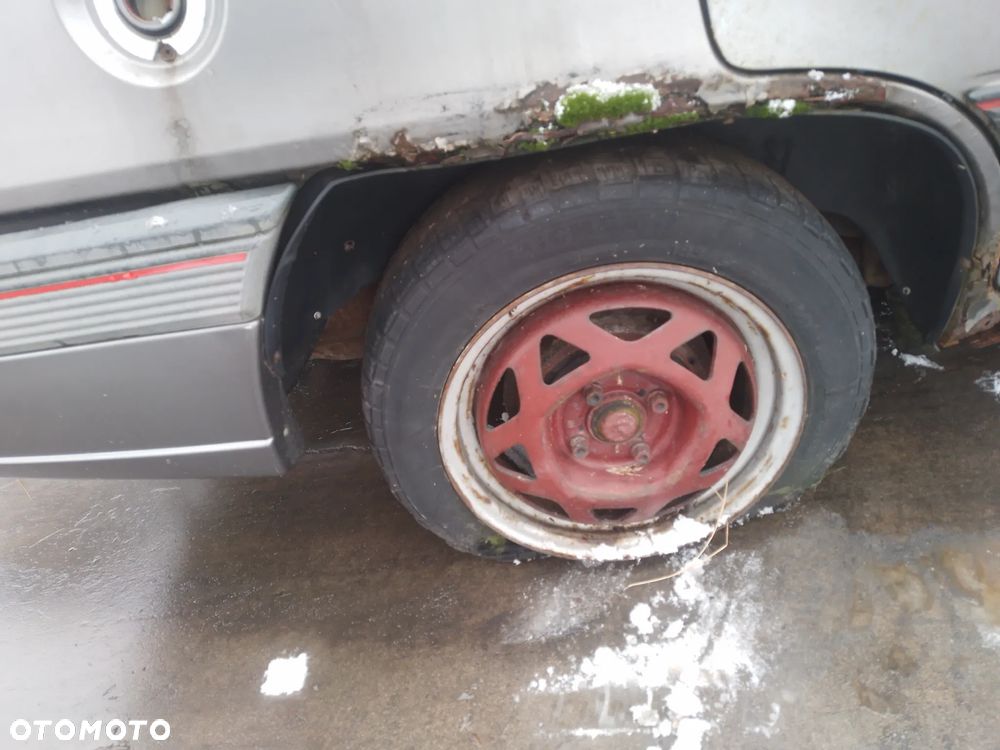 OPEL KADETT E LIFT 89-91    FELGI STALOWE KOMPLET - 2