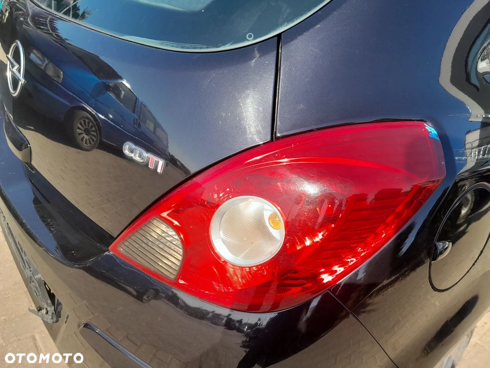 OPEL CORSA D LAMPA TYLNA PRAWA W BŁOTNIK 3D - 2