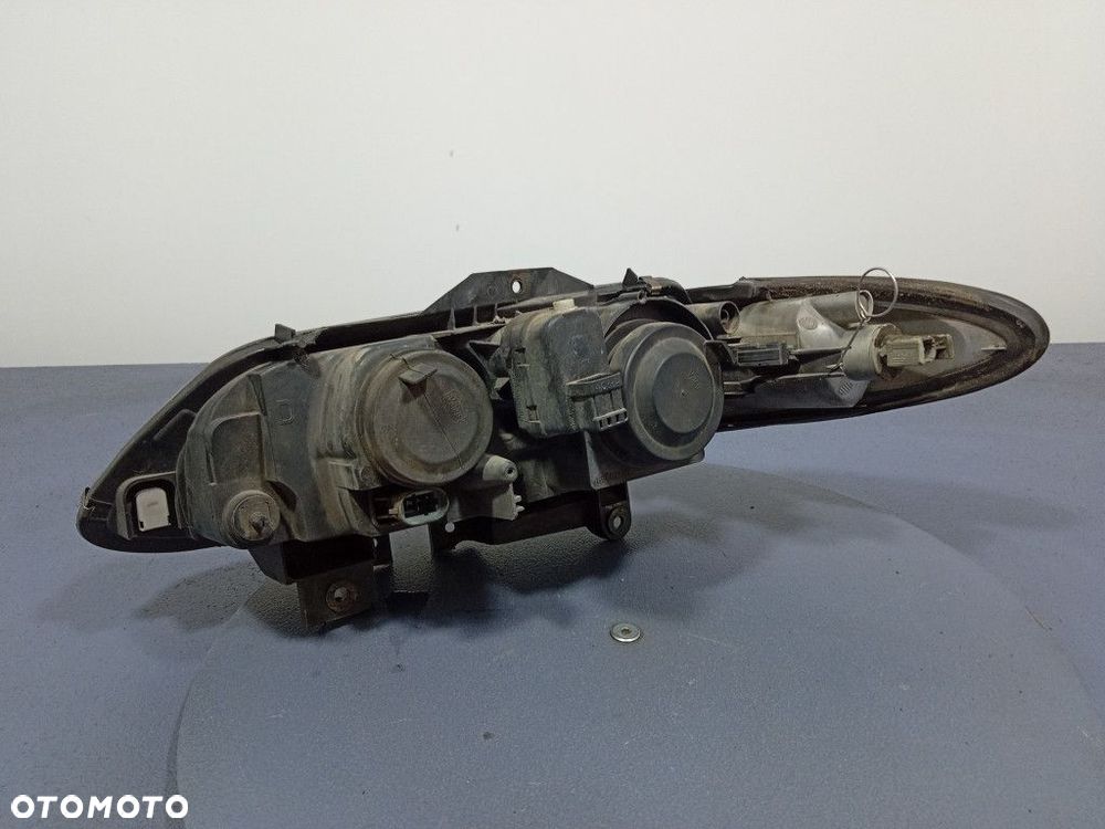 RENAULT ESPACE III LIFT REFLEKTOR PRAWY PRZEDNI LAMPA PRZÓD 89002587 - 8