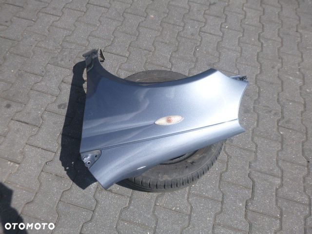 BŁOTNIK LEWY PRZÓD LEWY PRZEDNI TOYOTA YARIS I LIFT KOLOR 855 - 6