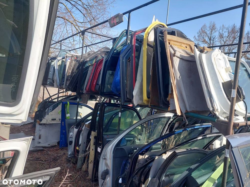 DRZWI KOMPLETNE LEWY PRZÓD SKODA OCTAVIA I FL 4590 - 7