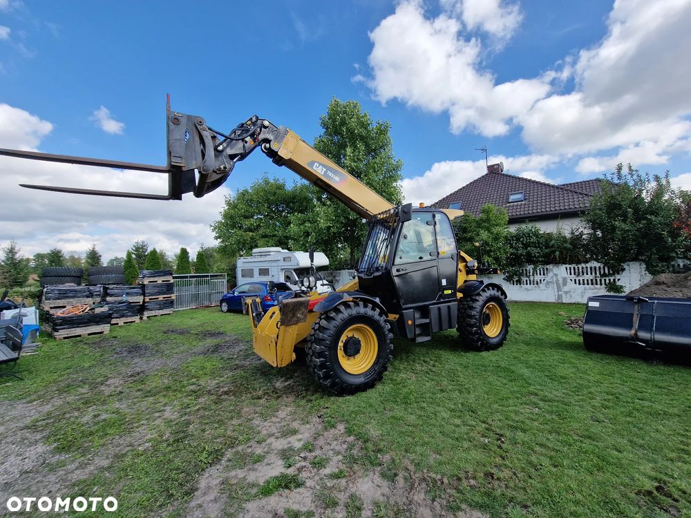 Caterpillar TH314D - 1