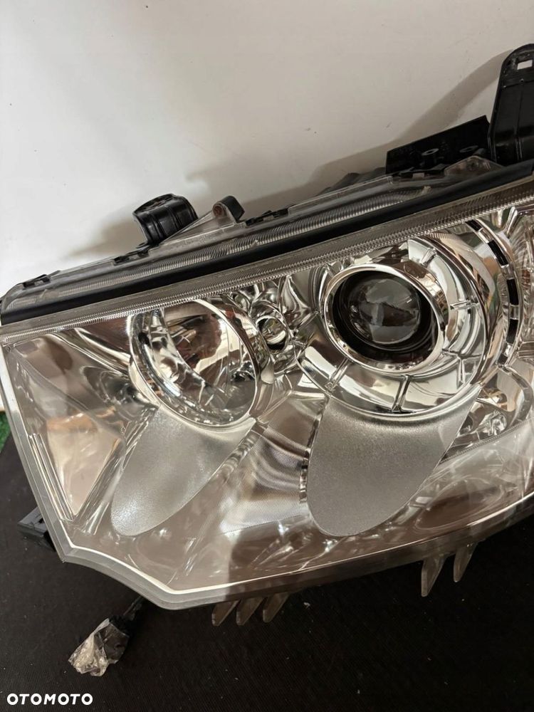 LAMPA LEWA REFLERTOR MITSUBISHI PAJERO SPORT L200 HALOGENOWA DEMONTAŻ EU - 7