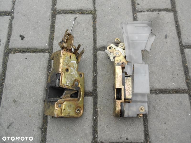 VW T4 90-03r. ZAMEK LEWY DRZWI LEWYCH KIEROWCY - 1