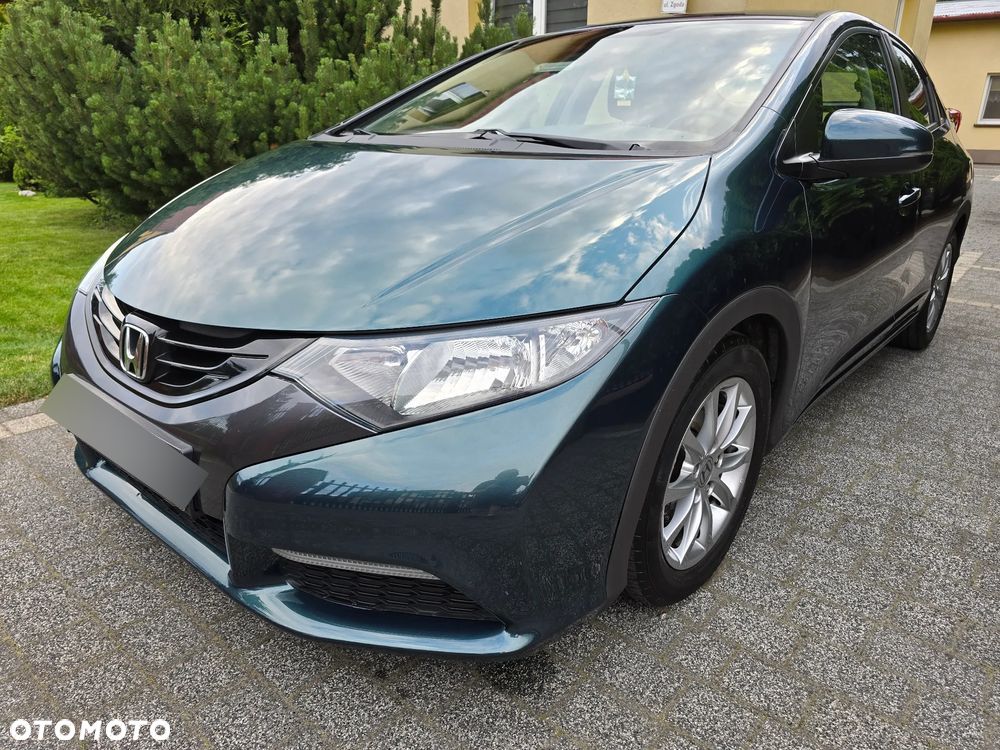 Honda Civic 1.4 i-VTEC Comfort - 1