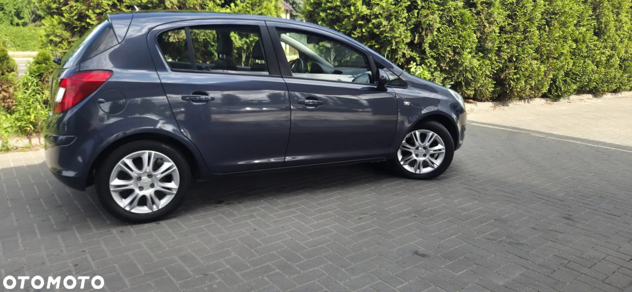 Opel Corsa 1.4 16V Cosmo - 19