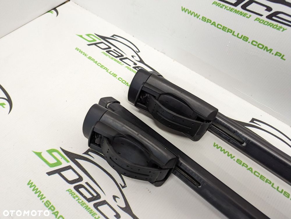 Bagażnik dachowy bazowy na otwarte relingi Thule 775 Squarebar 120cm z napisem Renault. - 5