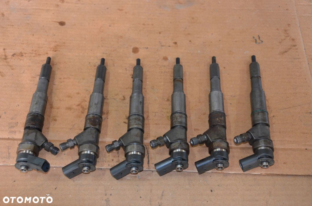 BMW E90 E60 E46 E87 2.0D 3.0D WTRYSKIWACZE 7788609 - 1