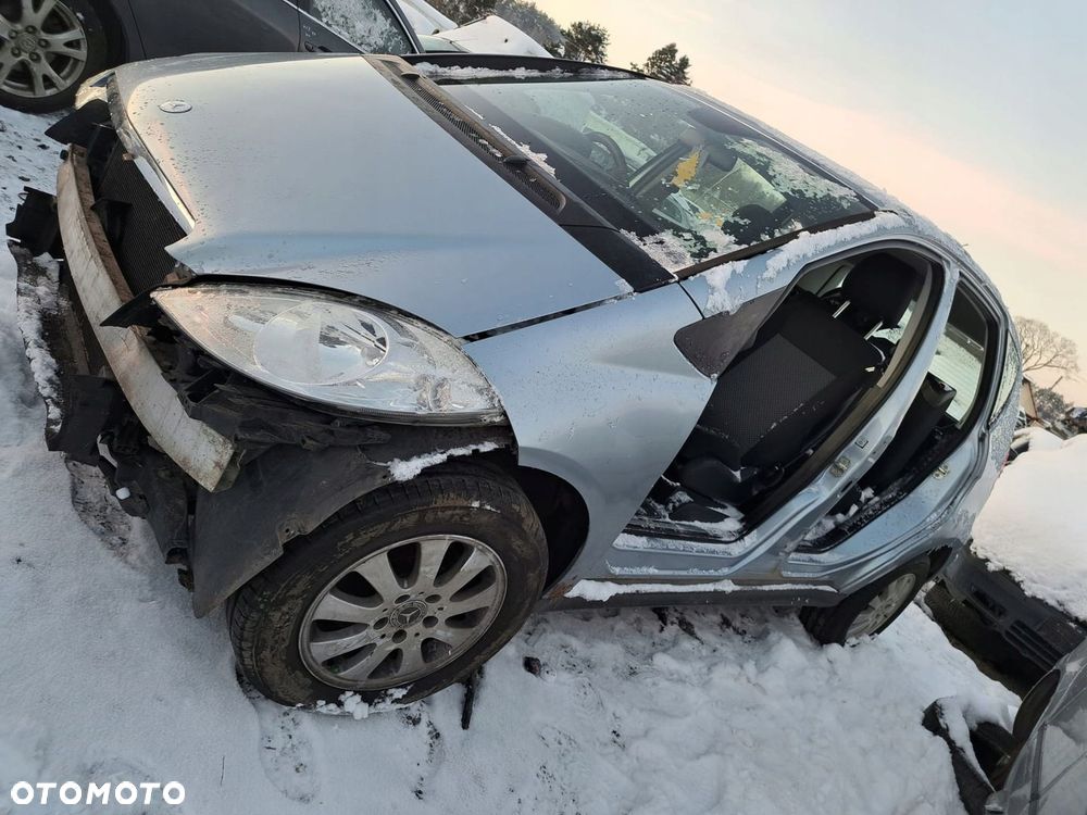 BŁOTNIK LEWY PRZÓD PRZEDNI MERCEDES A KLASA W169 KOD LAKIERU 391 - 2