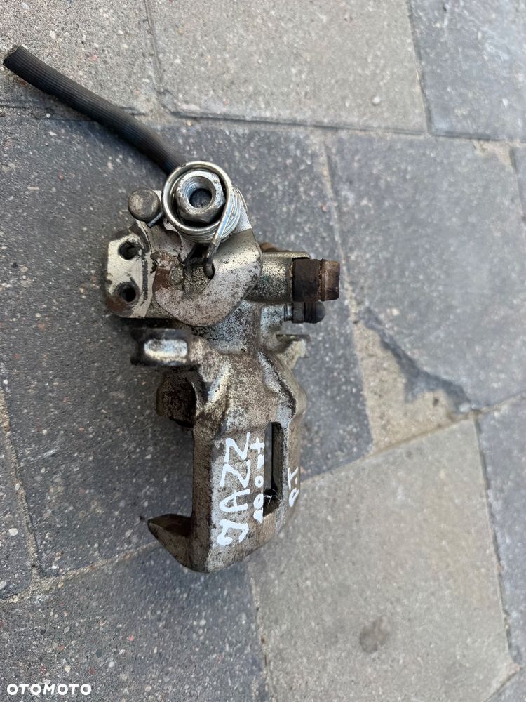 ZACISK PRAWY TYŁ HONDA JAZZ 02-08 JAK NOWY - 6