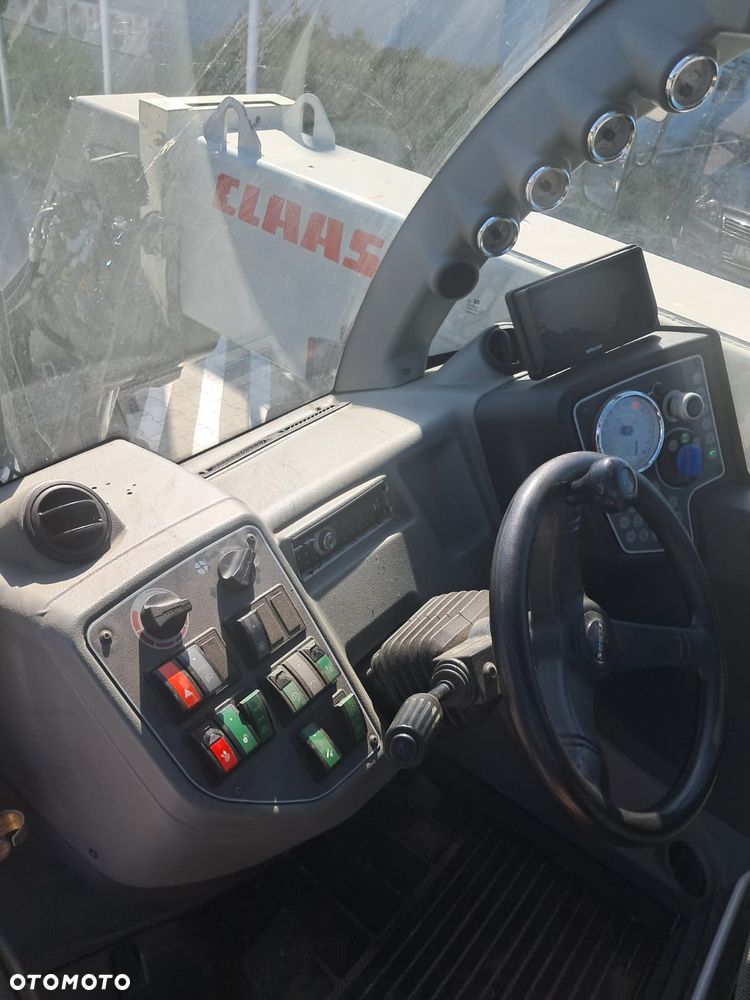 Claas Scorpion 7044 - 11