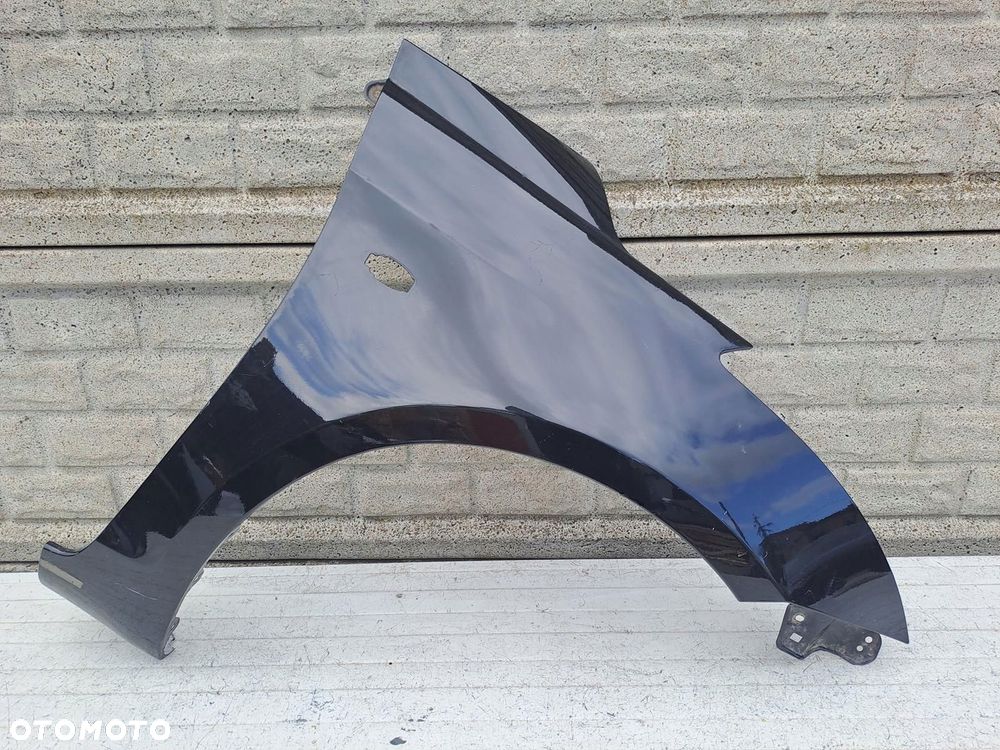 SUZUKI SWIFT Mk7 10-17 BŁOTNIK PRZEDNI PRAWY ORYGINAŁ - 1