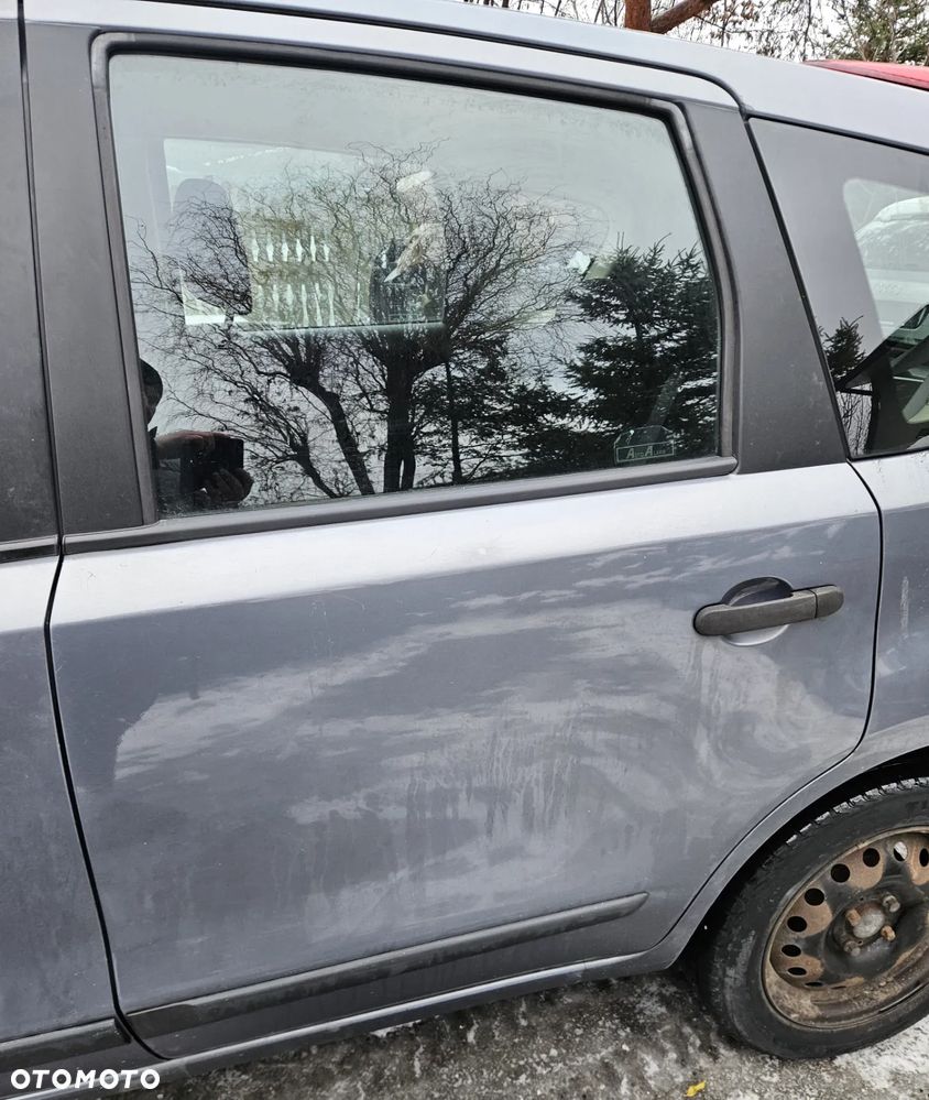 Nissan Note E11 07 drzwi tył tylne  lewe B52G - 2