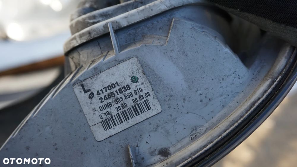 REFLEKTOR LAMPA ZBIORNIK PŁYNU SCHOWEK PASAŻERA ASTRA H - 5