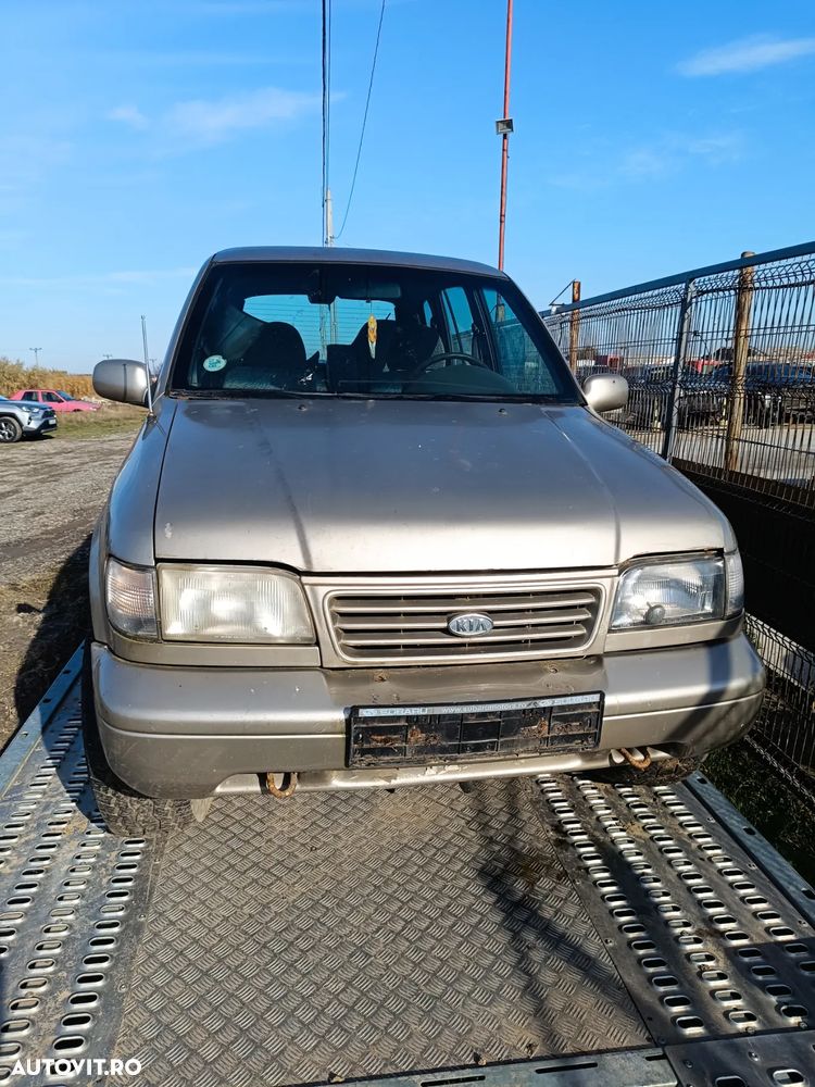 Dezembrez kia sportage 1 2.0b și 2.0d