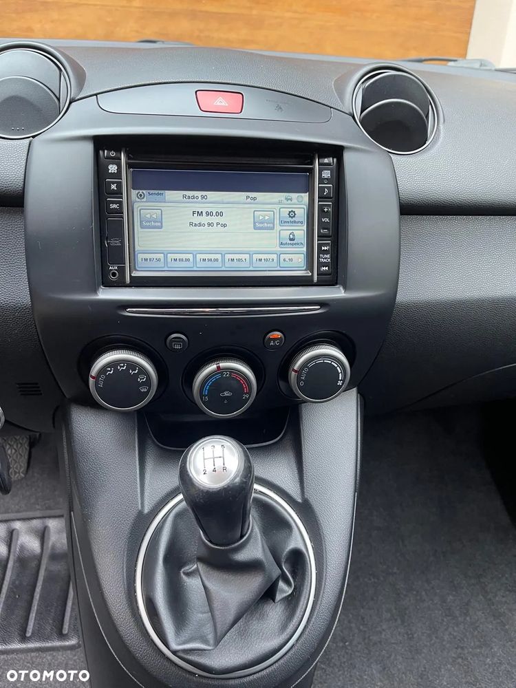 Mazda 2 1.3 Navi + - 8