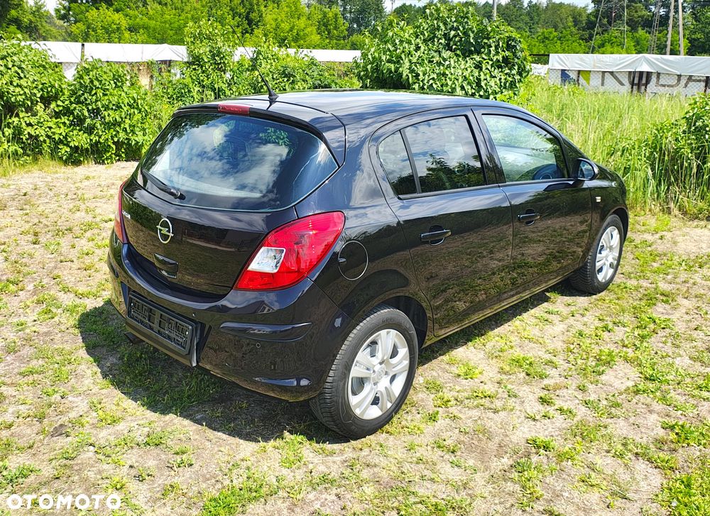 Opel Corsa 1.4 16V Cosmo - 9