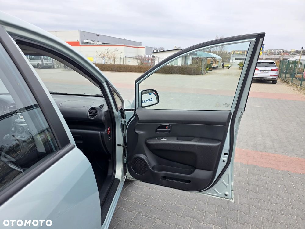 Kia Carens 2.0 CVVT LX Basis - 13