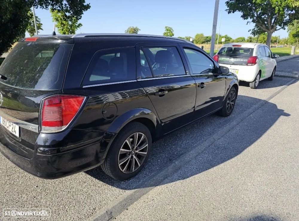 Opel Astra Caravan 1.3 CDTi Cosmo - 1