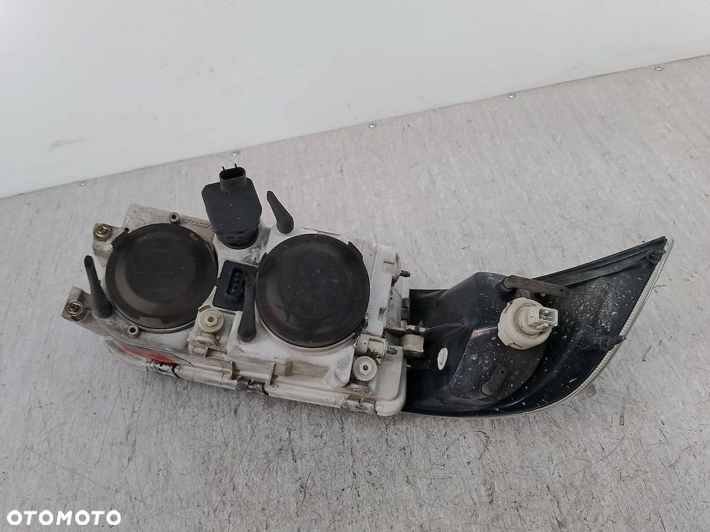 LAMPA PRZÓD LEWA VOLVO V40 ( 95-04 ) 1AG247002-01  30899878 - 2