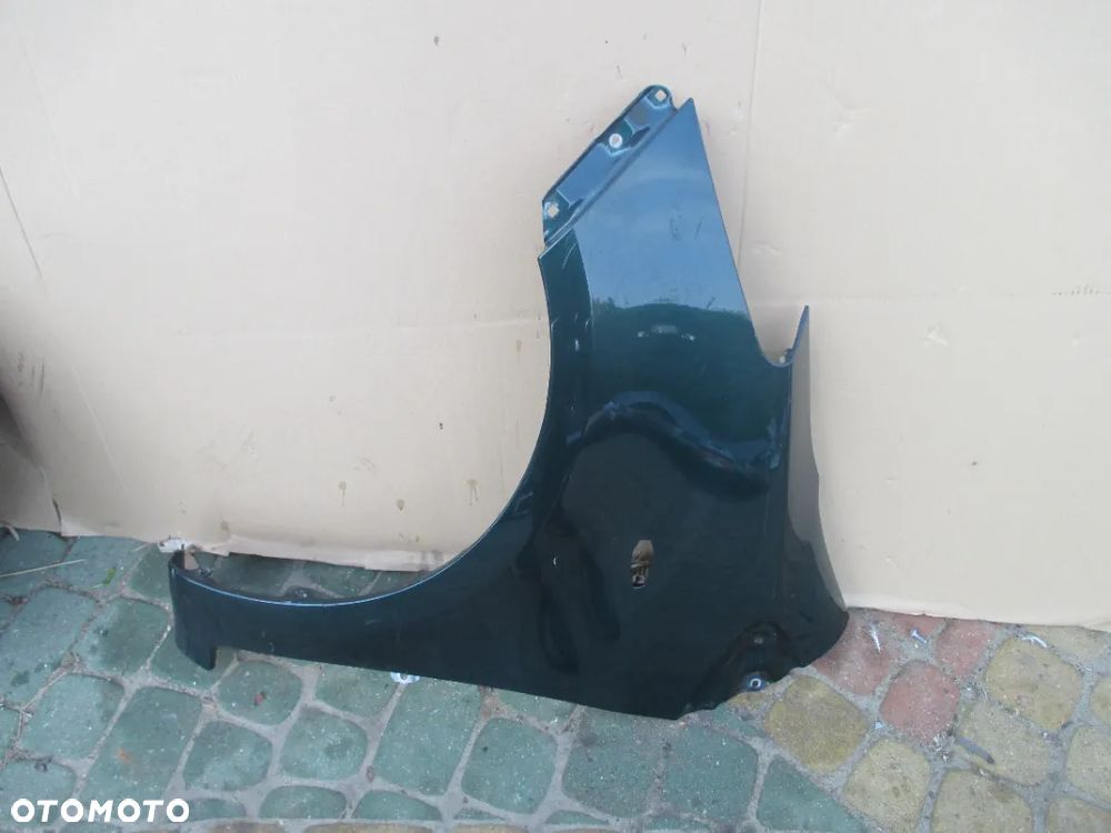 Błotnik lewy TOYOTA YARIS II 6S3 BEZ RDZY ORGINAŁ - 1