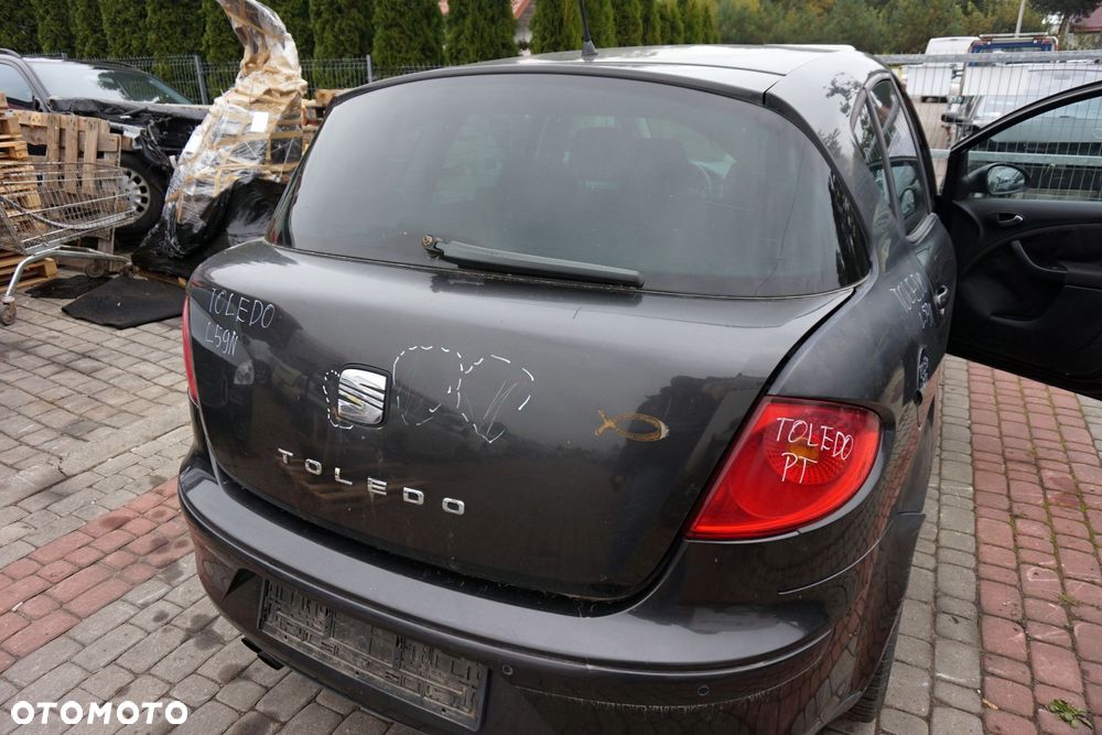 KLAPA BAGAŻNIKA TYLNA TOLEDO III 5P LS9N  CZARNY SEAT 2004-2009 - 2