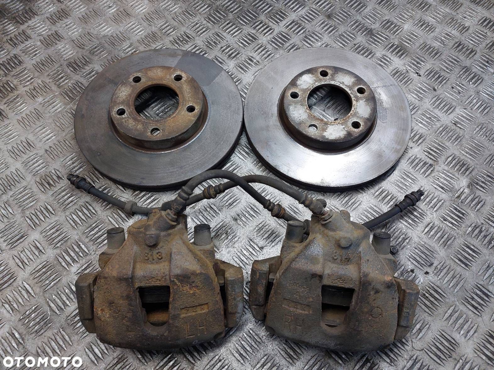TARCZE HAMULCOWE PRZÓD + KLOCKI + ZACISKI MAZDA 3 I BK 1.6 D - 1