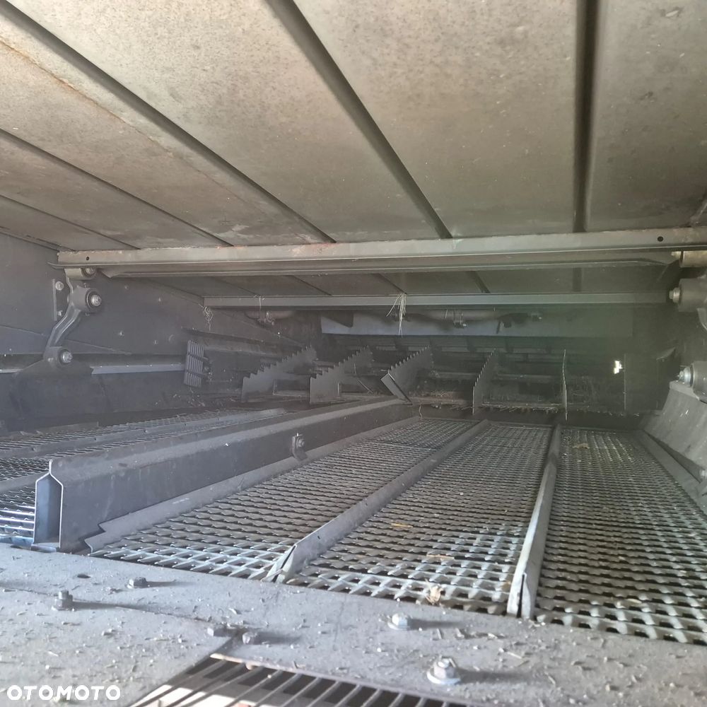 Claas Lexion 650 z hederem - 13