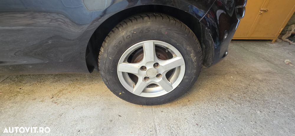 Opel Corsa 1.4i Enjoy - 11