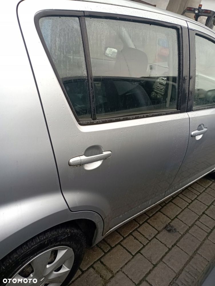 DAIHATSU SIRION II DRZWI PRAWE TYŁ TYLNE GOŁE