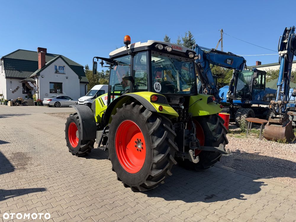 Claas Axos 320 - 2
