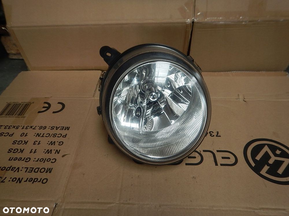 lampa przod prawa jeep liberty - 1