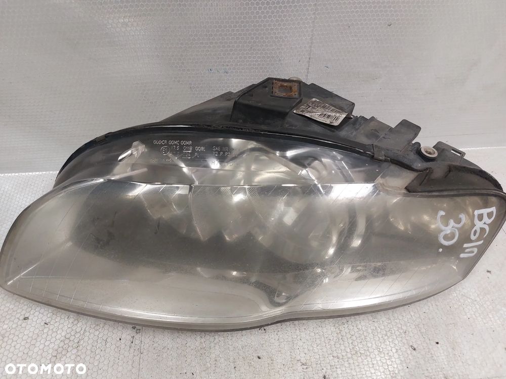 .  LAMPA PRZOD PRZEDNIA LEWA AUDI A4 B7 - 2