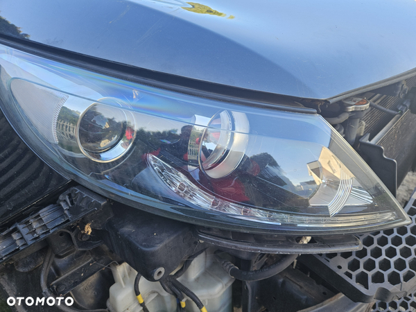 Kia Sportage III lampa przednia lewa prawa UK