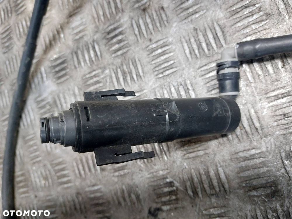 SPRYSKIWACZ LAMPY LEWY BMW X1 E84 7321891 - 3