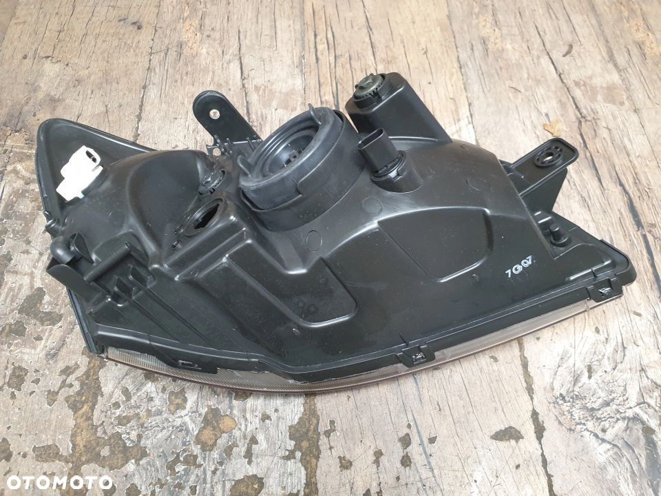 Oryginalna lampa lewa reflektor Hyundai Getz 92110-1C010 - 8