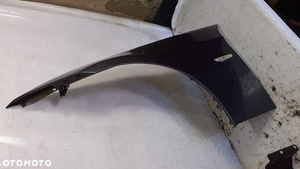 * BŁOTNIK LEWY PRZÓD BMW E90 E91 - 2