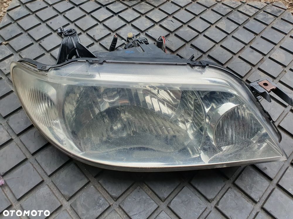 MAZDA 323 F BJ LIFT 2002-2003 LAMPA PRAWA PRZEDNIA EUROPA   STANLEY P1364 - 1