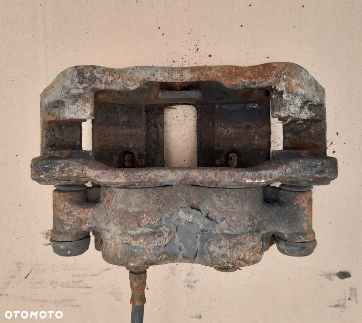 ZACISK HAMULCOWY LEWY TYL MASCOTT 3.0 3.5T AL4 - 2