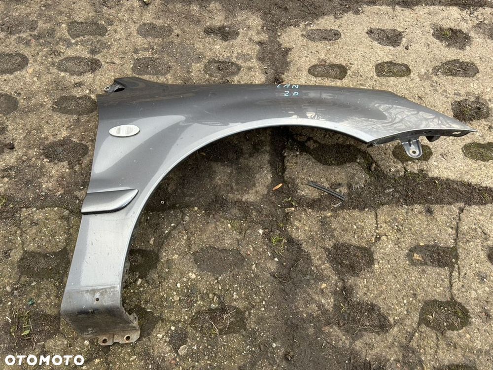 MITSUBISHI LANCER VII 03- BŁOTNIK PRAWY PRZÓD KOLOR A39 - 1